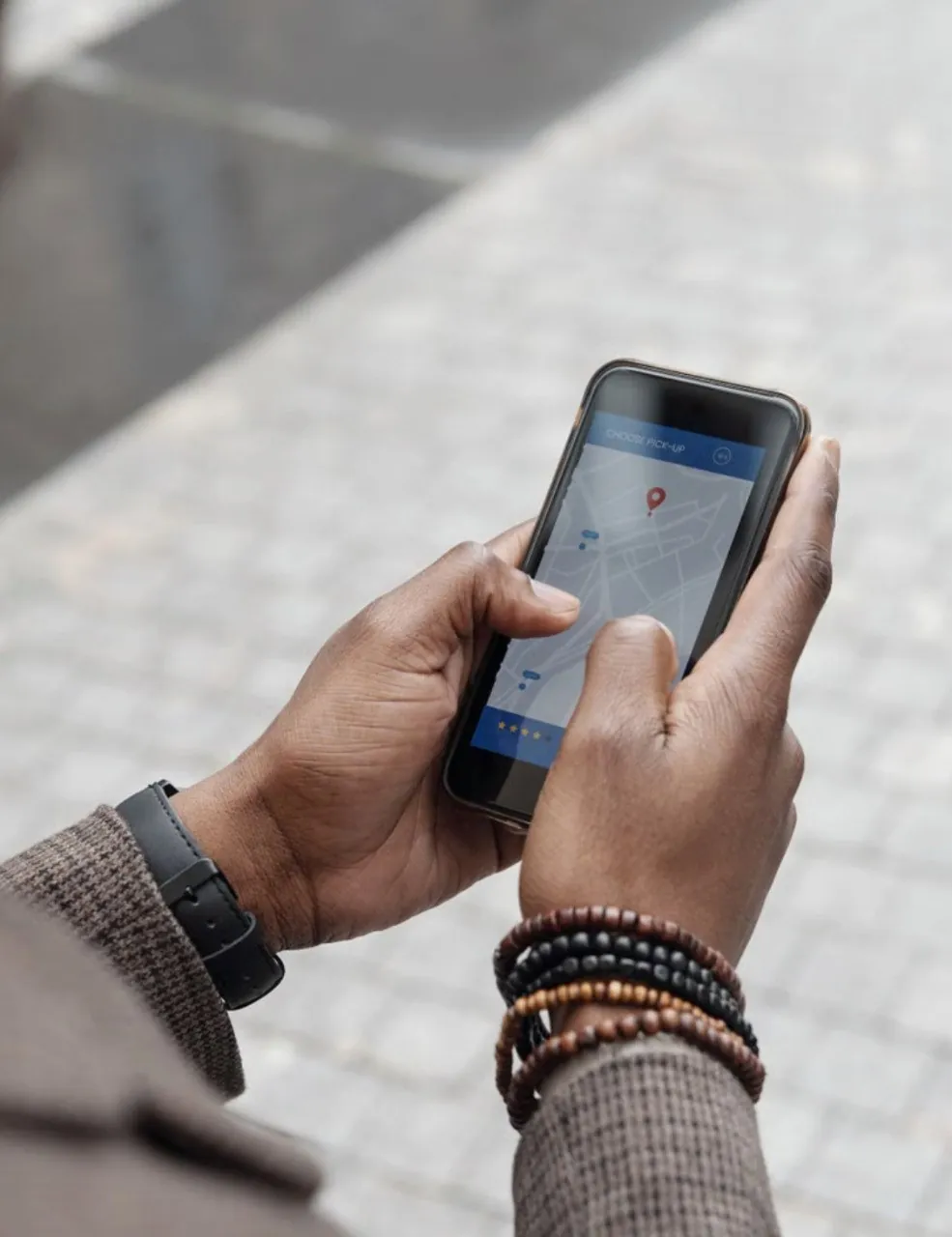 Person using map app on smartphone.