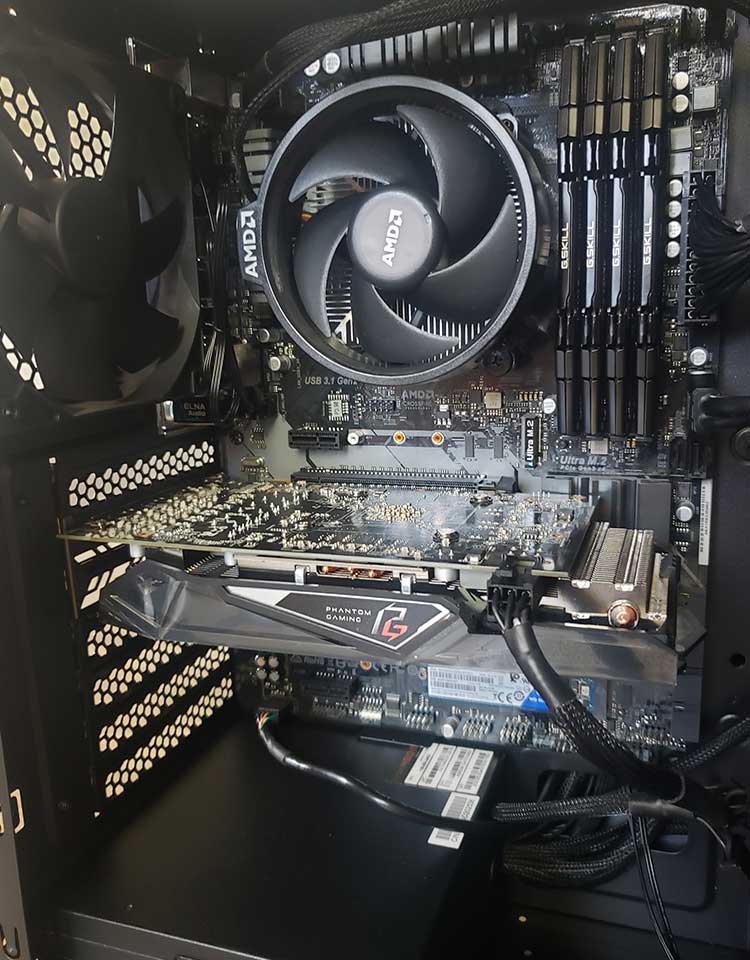 Solid state drive upgrade beside a business laptop used for office work